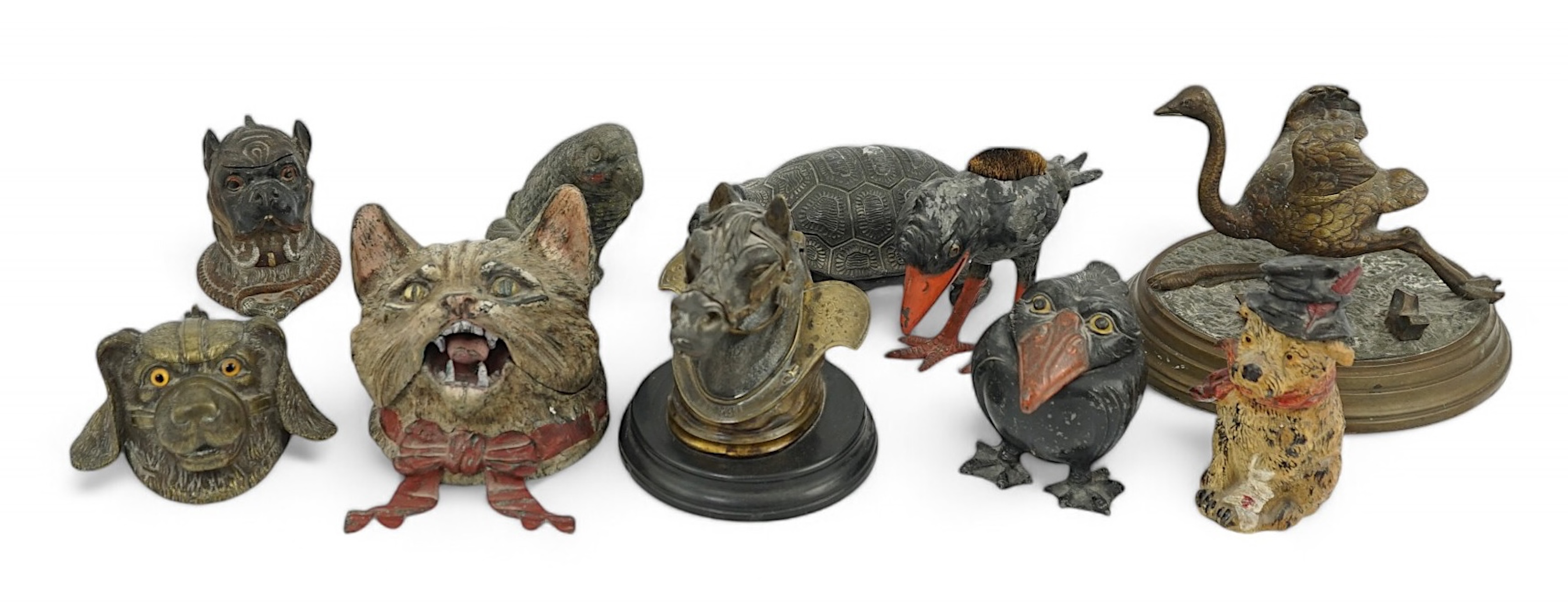 A collection ten 19th and 20th century novelty animal bronze and metal ink wells, including a Martin Brothers style ‘Wally’ inkwell